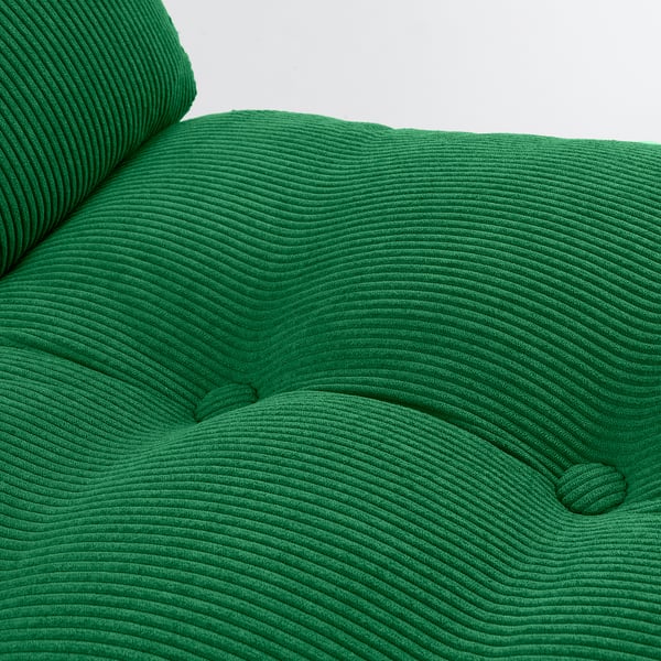 Bright green, ribbed fabric swivel chair close-up, showcasing high-quality texture and design.