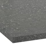 Sleek, speckled gray countertop with smooth, polished edges, showcasing durable, easy-to-clean surface.