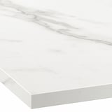 Smooth, pristine white kitchen countertop in excellent condition. Clean lines, unblemished surface.