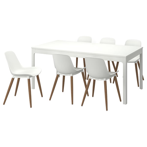 Modern white dining set with rectangular extendable table and six curved chairs.