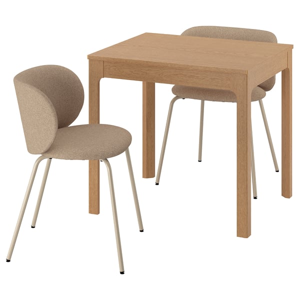 This image the EKEDALEN dining set in natural wood, including a rectangular table and two chairs with beige upholstery.