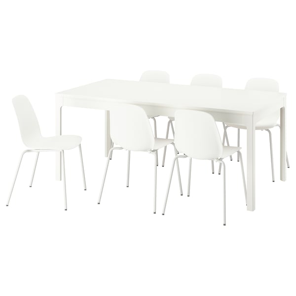 White EKEDALEN extendable dining set. Four chairs, one extendable table with leaf, all in white, modern minimalistic design.