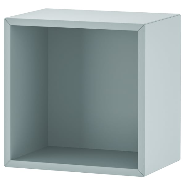 An EKET cube shelf, light blue, square-shaped with open storage, made of particleboard and fiberboard.