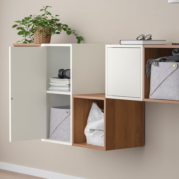 Wall storage cubes hide & display items. Shelves hold books, headphones. Cabinets store clothes. Easy-opener.