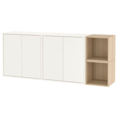 EKET wall-mounted storage unit, light brown. Three closed cabinets, one open cube.
