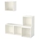 Three white EKET storage cubes in varying sizes, stacked and mounted, minimalist and modular design.