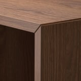 Dark wooden cabinet close-up, smooth, polished surface, sturdy joinery detail.