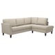An EKHOLMA beige sectional sofa with a sleek design, plush cushions, and dark wooden legs.