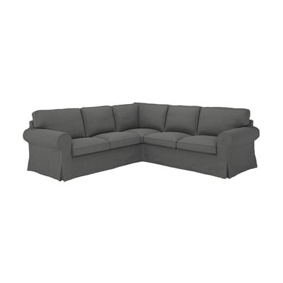 A dark gray, l-shaped EKTORP sectional sofa with rolled arms and a sleek, modern design.