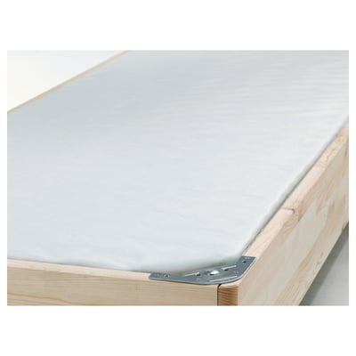 Wooden bed frame with metal support brackets and a foam mattress.