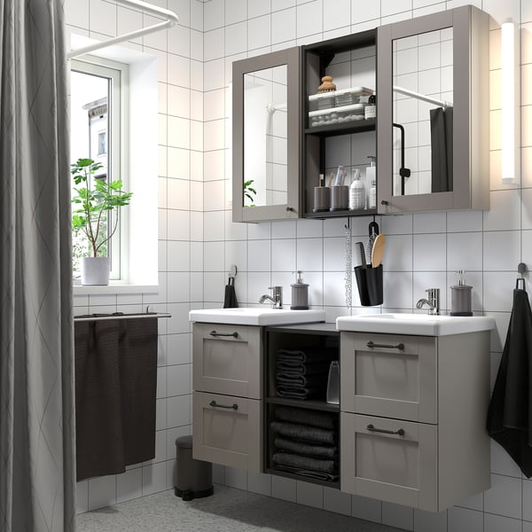 Modern gray ENHET bathroom with double vanity, open/closed storage, mirrored cabinets, and ample counter space.