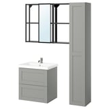 Modern grey bathroom setup featuring ENHET with drawer unit, tall cabinet, and framed mirror. Clean, organized design ideal for small spaces.