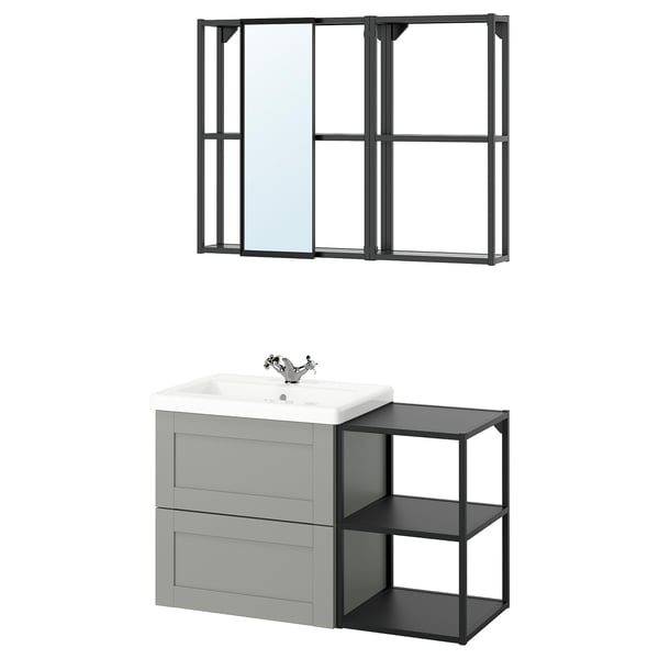 Modern grey bathroom vanity with white sink, mirror, and open shelves. Industrial design with metal and wood elements.