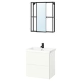 Modern bathroom setup with ENHET white cabinet, black faucet, and wall-mounted mirror with black frame.