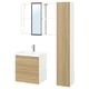Option: A modern wooden bathroom cabinet with a white sink, a tall storage cabinet, and a wall-mounted mirror. The units have a light wood finish.