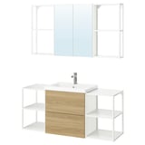 This image shows an ENHET bathroom vanity set in white and wood, featuring a sink, mirrors, and shelving.