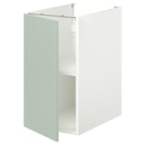 An ENHET base cabinet in pale grey-green with one open door revealing an empty shelf inside.