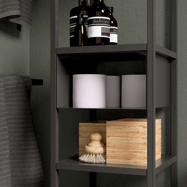 Shelf organizer with bottles, canisters, and brush. ENHET series, keeps items secure and dust-free.