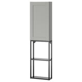 A grey ENHET storage unit with a closed cabinet and open shelves, ideal for organizing items in a modern and minimalist style.