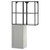 Gray ENHET cabinet with black metal frame, open & closed storage.