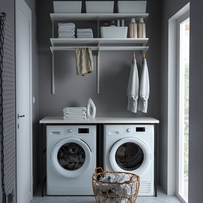 Laundry room with ENHET combo, washer, dryer, iron, and baskets.
