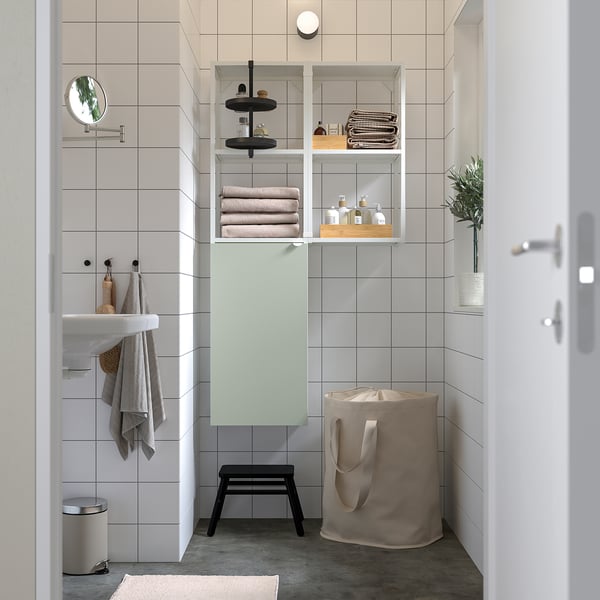 Modern bathroom with ENHET light grey-green storage unit, open/closed compartments, fitting under shelves.