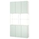 An ENHET storage combination in pale green. Its a tall unit with closed cabinets on top and bottom, and open shelves in the middle.