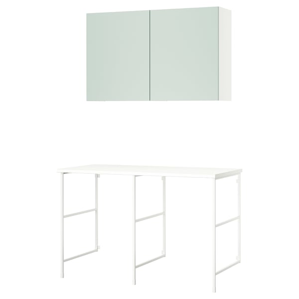 An ENHET storage unit. It light gray-green cabinets and a white countertop with a metal frame.