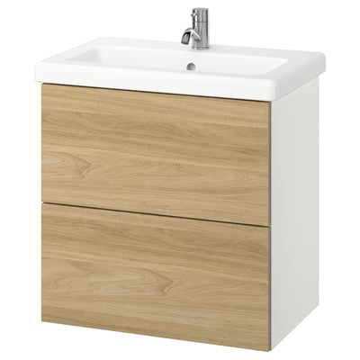Modern bathroom vanity in oak, white ceramic sink, chrome faucet.