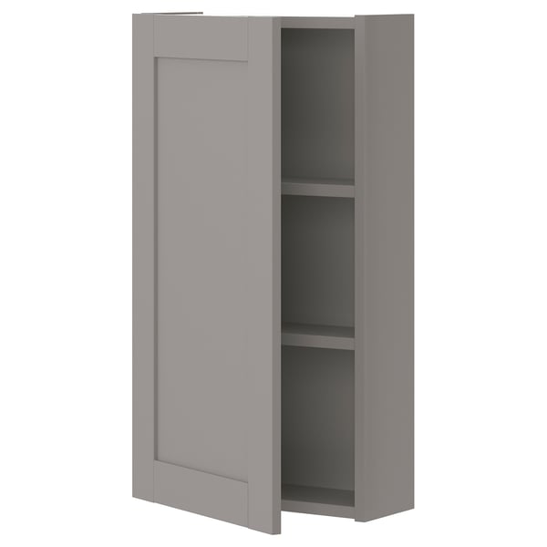 Gray ENHET wall cabinet with 2 shelves, modern design, slightly open door.