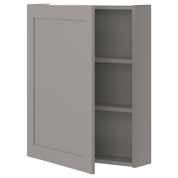 A grey ikea ENHET wall cabinet with a door open, revealing two shelves inside. The cabinet is rectangular, simple, and modern in design.