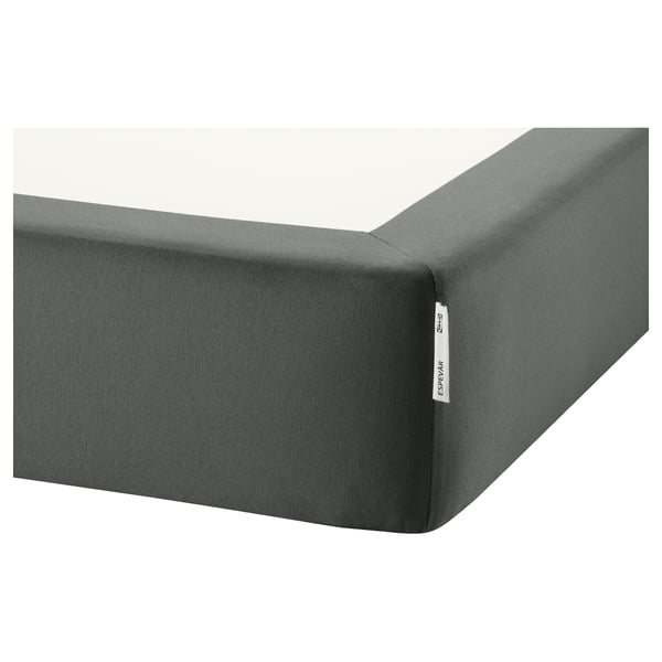 A sturdy, gray mattress base with a smooth, removable cover, providing support and elevating the bed.