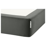 A high-quality grey mattress base with a smooth cover, designed for comfort and durability.