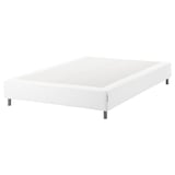 White espevar bed base, upholstered, rectangular, raised on metal legs.