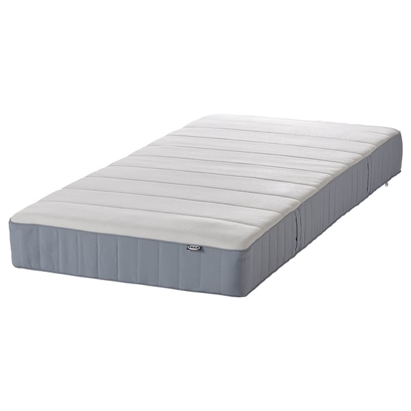 IKEA rolled mattress, gray, cotton-polyester, rectangular, soft lines.