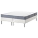 Option: Modern, white bed with grey mattress on metal legs. Comfortable and stylish.