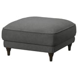 An ESSEBODA footstool in gray with turned wooden legs and a plush, rectangular shape for comfort.