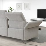 Modern living room with FAMMARP light grey sofa. Adjustable headrests and arms, sleek design, metal legs.