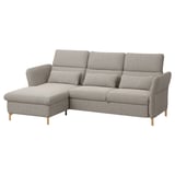 A grey FAMMARP sectional sofa with adjustable headrests, wooden legs, and a cozy corner design. It has a modern, comfortable look.