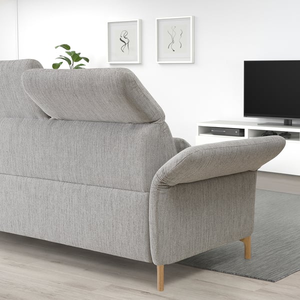 Grey FAMMARP sofa in modern living room, art, tv, plant.