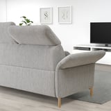 Grey FAMMARP sofa in modern living room, art, tv, plant.