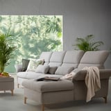 Modern cousin gray sofa with polyester-cotton fabric, adjustable headrests, and decorative pillows against a green wall mural.