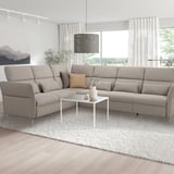 Modern living room with FAMMARP sectional sofa, throw pillows, coffee table, pendant light, large windows.