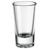 FIGURERA shot glass. Clear, transparent, cylindrical with wide base. Simple, sleek design. Made from glass. Perfect for spirits.