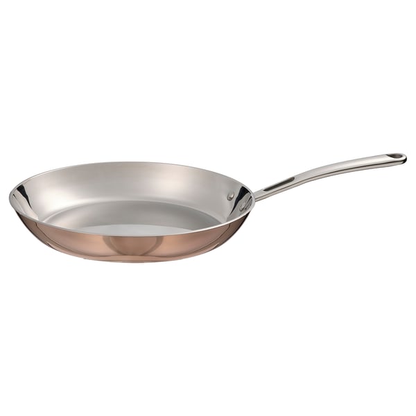 FINMAT copper frying pan: elegant, round, shiny inside, stainless steel handle, ideal for various hobs.
