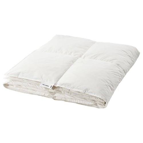 A white fjällräven FJÄLLARNIKA duvet. Its rectangular with stitched compartments, designed for warmth with a cotton cover and down filling.