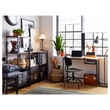 Home office setup with FJÄLLBO desk, black, metal and wood, industrial design.