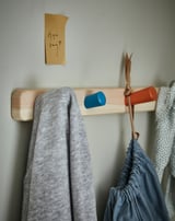 Towel on blue rack.