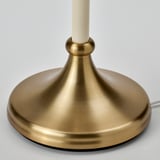 Gold-colored metal lamp base with smooth finish.