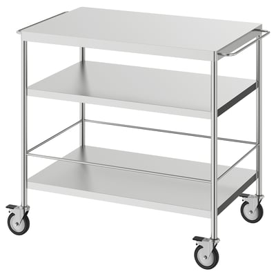 Stainless steel FLYTTA cart, 3 shelves, lockable wheels.
